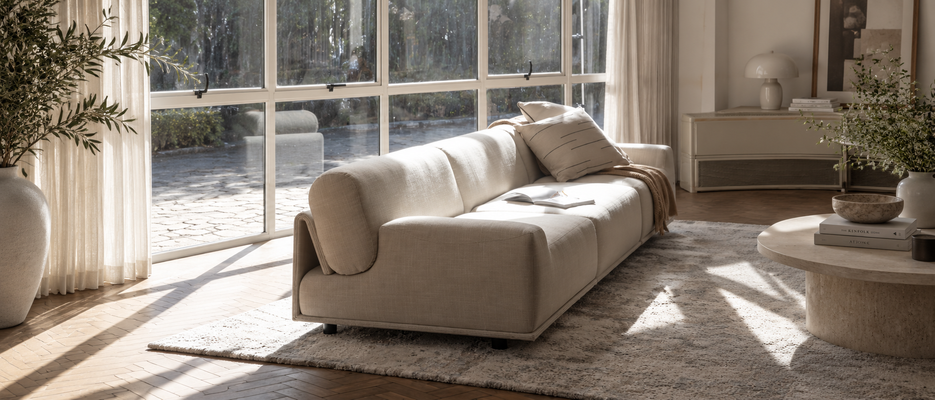 Soft textiles and relaxed layers for everyday interiors